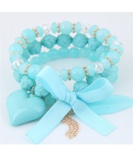 Peach Heart Bowknot and Feather Pendants Three Layers Beads Combo Fashion Bracelets - Blue