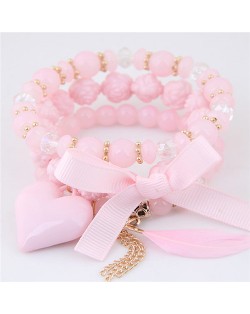 Peach Heart Bowknot and Feather Pendants Three Layers Beads Combo Fashion Bracelets - Pink