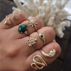 Snake and Buddha Assorted Fashion Elements 7 pcs Golden Rings Combo