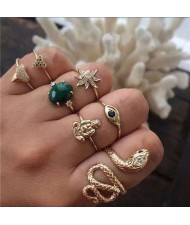 Snake and Buddha Assorted Fashion Elements 7 pcs Golden Rings Combo