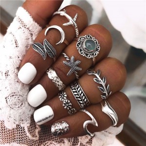 Hollow Flowers Seashell Wings and Constellation Assorted Fashion Designs 14 pcs Women Alloy Rings Set