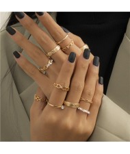 U.S Wholesale Fashion Jewelry Punk Style Bold Hollow Twist Design 12pcs Rings Set - Golden