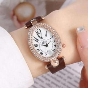 Rhinestone Rimmed Oval Shape Unique Design Women High Fashion Leather Wrist Watch - Brown