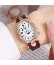 Rhinestone Rimmed Oval Shape Unique Design Women High Fashion Leather Wrist Watch - Brown