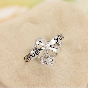 Bowknot with Rhinestone Inlaid Dangling Heart Design Platinum Plated Alloy Ring