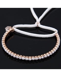 Korean Fashion Czech Rhinestone Inlaid with Hollow Cube Pendant and Rope Bowknot Golden Bracelet - White