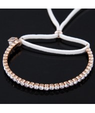 Korean Fashion Czech Rhinestone Inlaid with Hollow Cube Pendant and Rope Bowknot Golden Bracelet - White